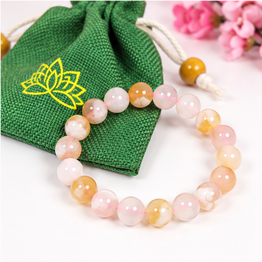 Bracelet en agate fleur de cerisier 8mm avec sa pochette en tissu