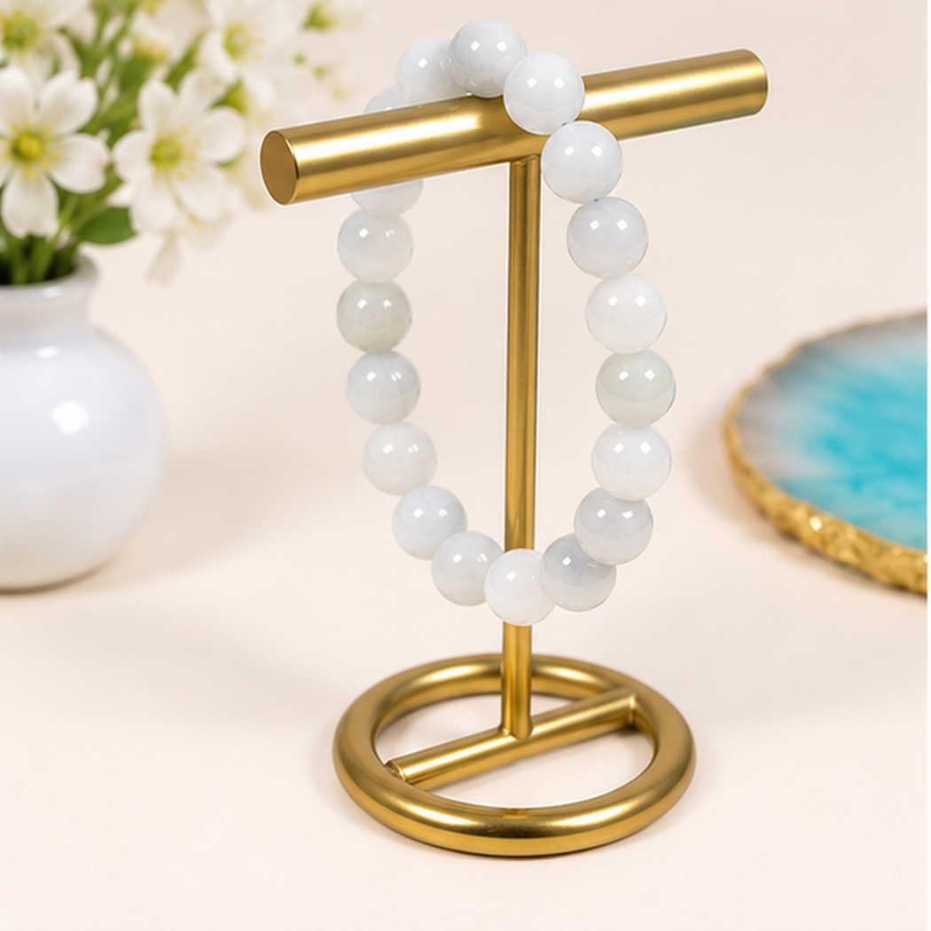 Bracelet extensible en aigue-marine aux perles rondes blanc laiteux et bleu pâle