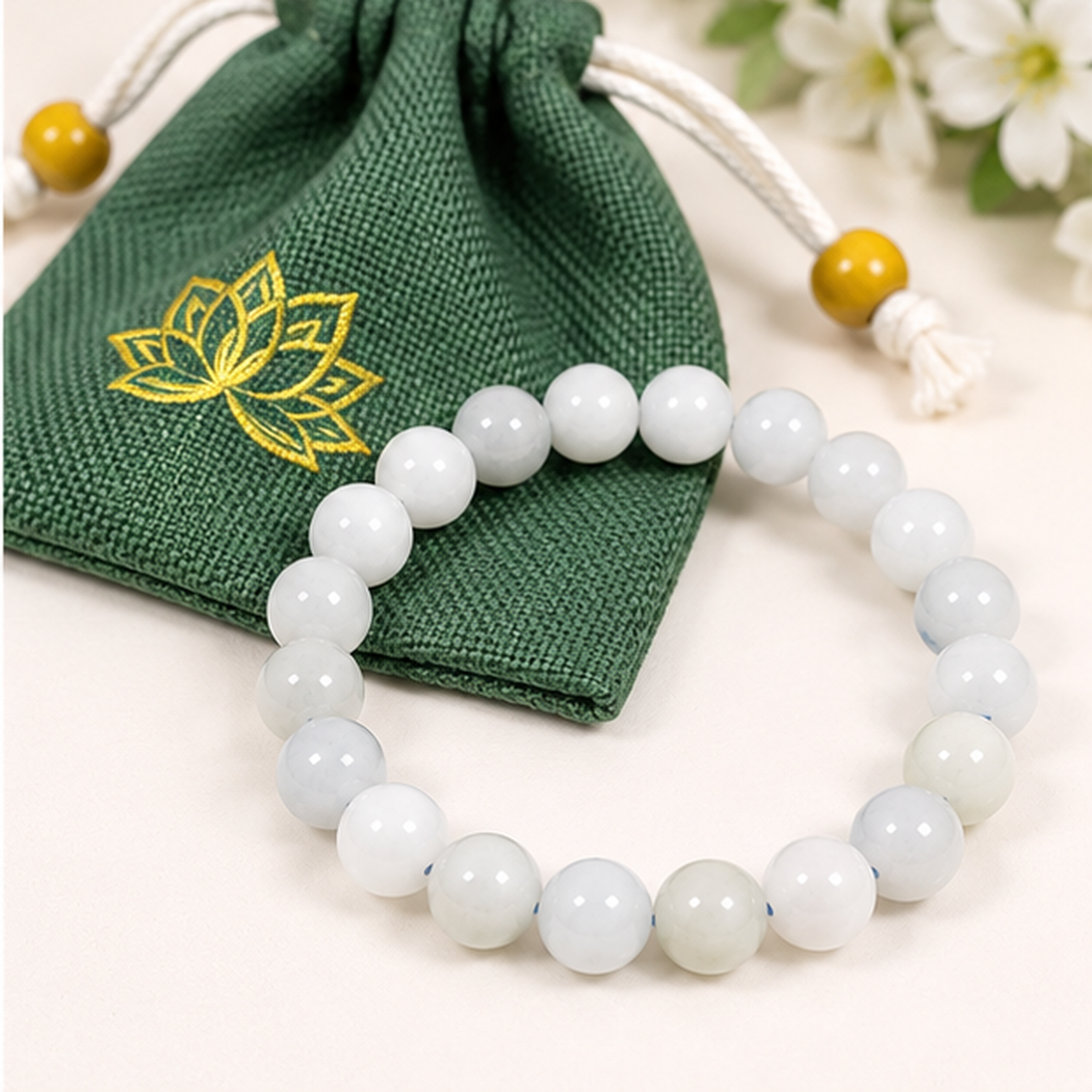 Bracelet en aigue-marine naturelle 8mm avec sa pochette en tissu