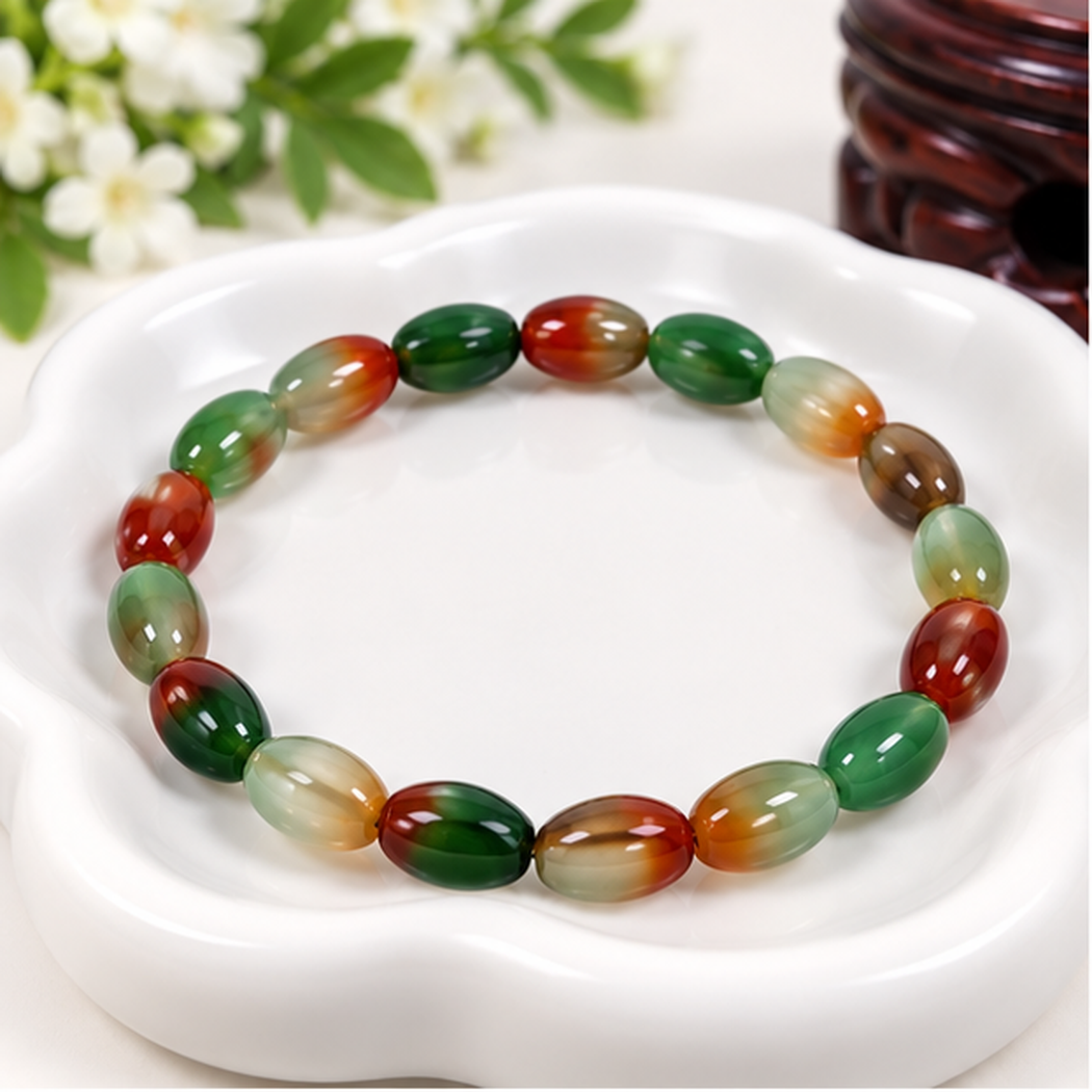Bracelet extensible en agate paon naturelle avec perles ovales de 8mm aux nuances vertes, brunes et rouges